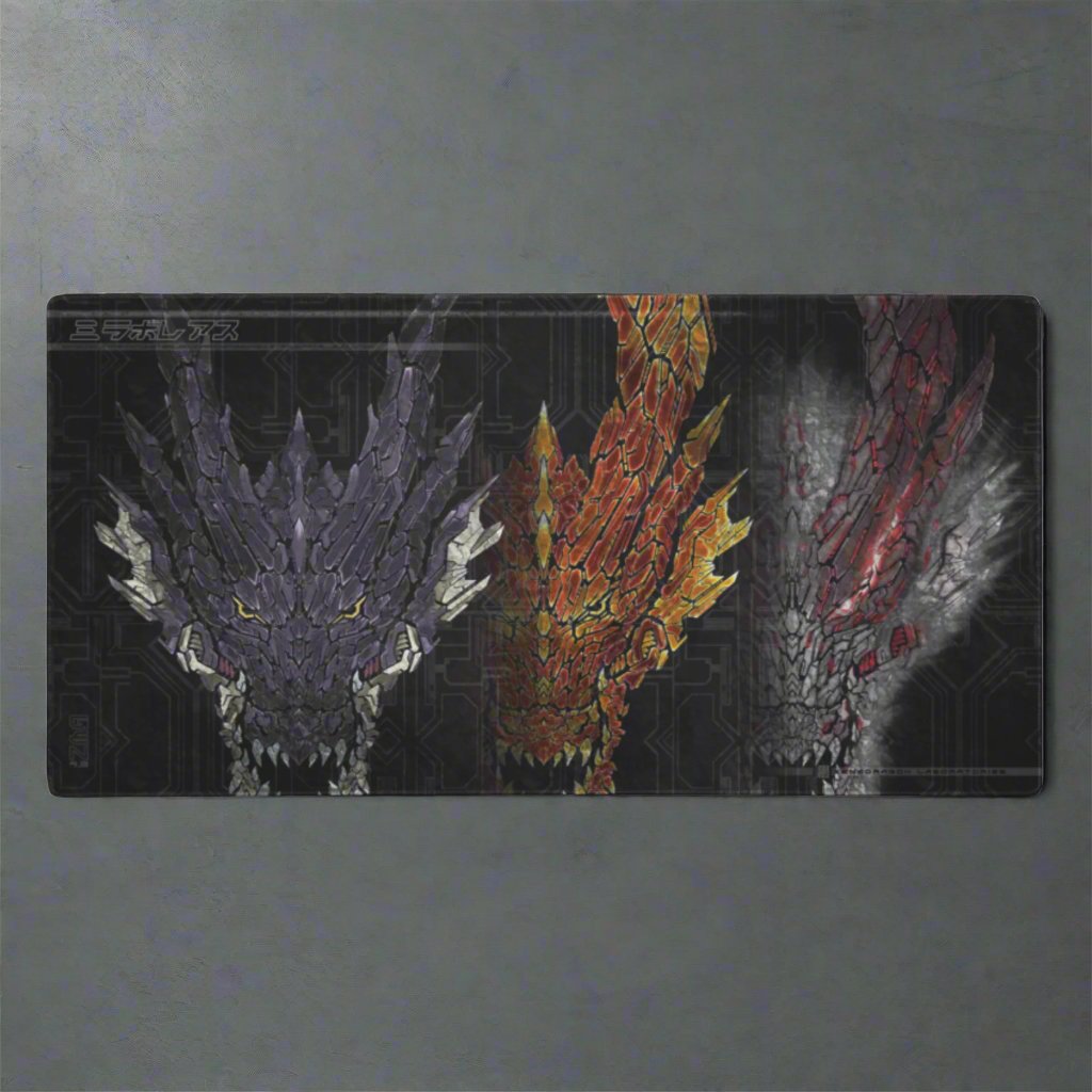A black mousepad featuring three stylized dragon heads in different colors: purple, orange, and gray. The Japanese text "ミラボレアス" is written at the top.