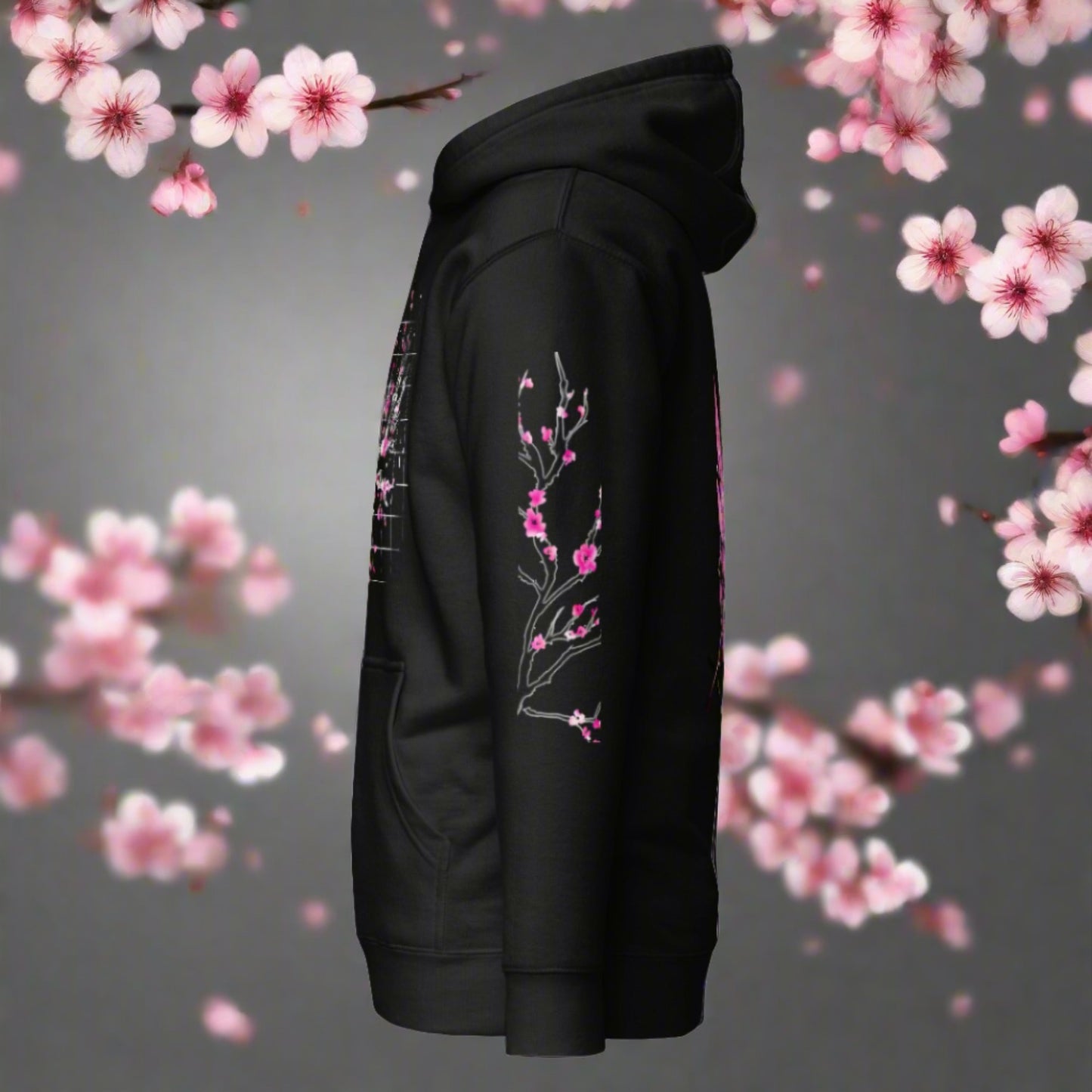 A black hoodie that features a cherry blossom branch on the left sleeve of the hoodie.