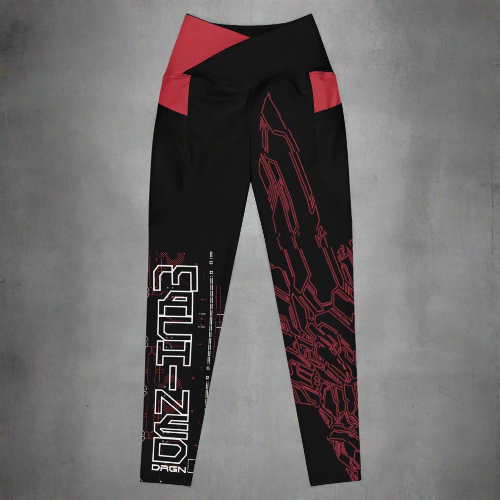 A pair of black leggings with red accents and a red and white geometric pattern design based on XeneDragon's generation three DRGN. The leggings have pockets and the word "MACHINED" is written on one leg.