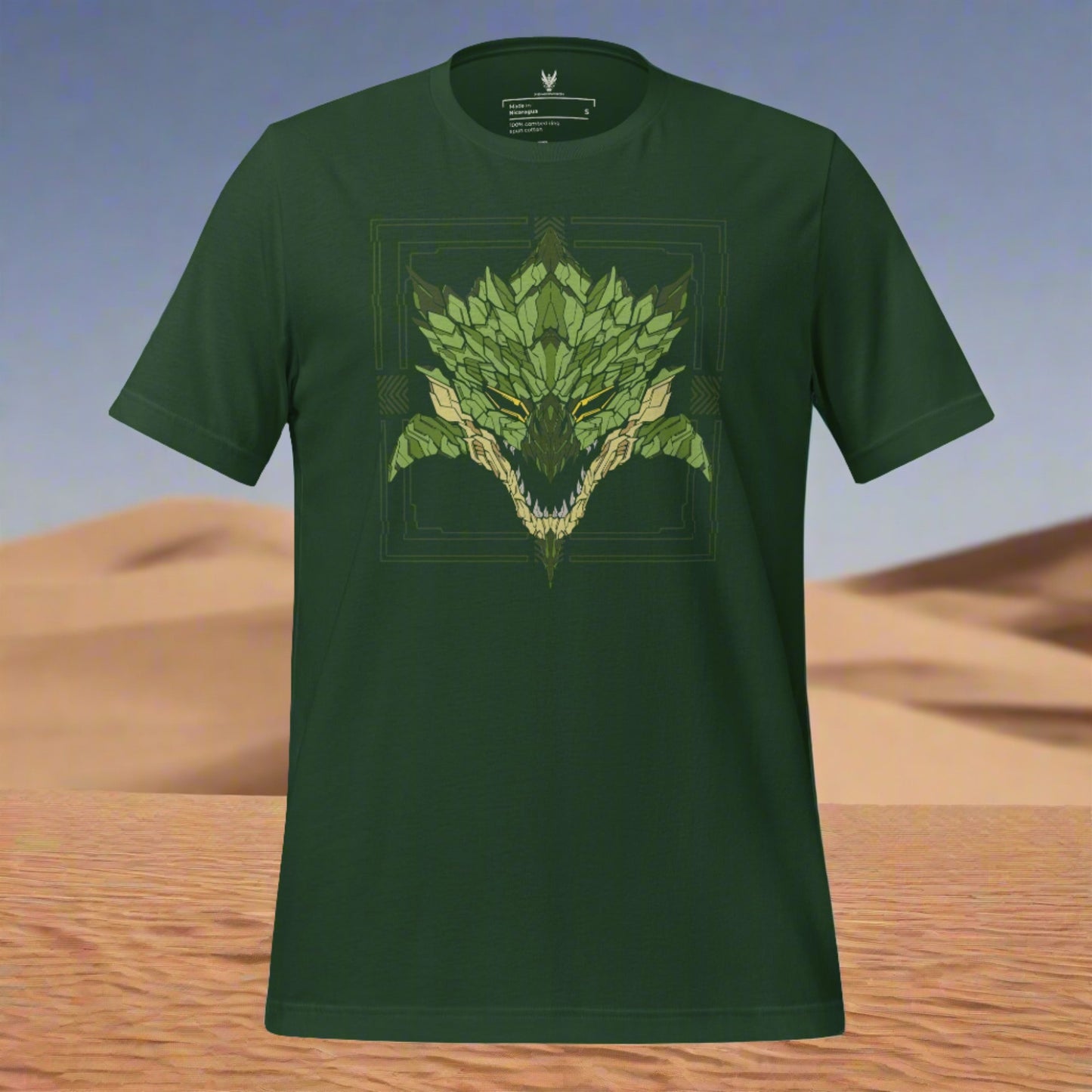 A green shirt with a detailed design of a stylized monster's head. The design features green themes with yellow blue eyes. Also darker greens for the scales and horns. Designed by XeneDragon.
