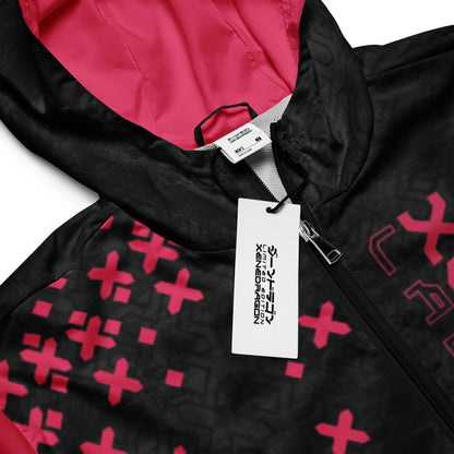 A close-up of A red and black hooded jacket with a zipper. The jacket has a zipper and a tag attached.