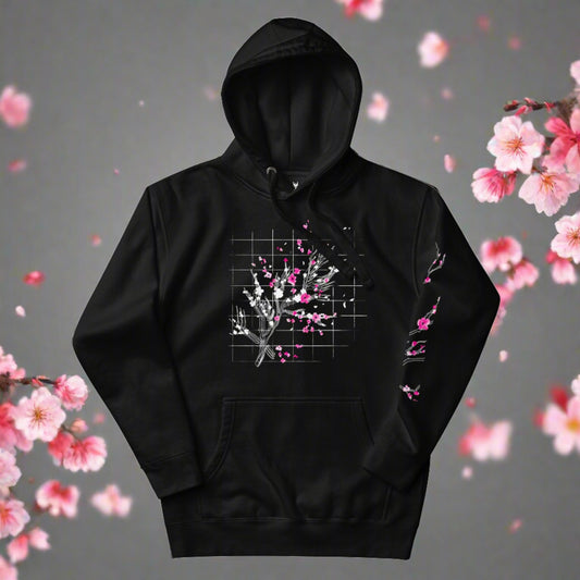 A black hoodie with a graphic design featuring a stylized image of a cherry blossom branch against a grid pattern.