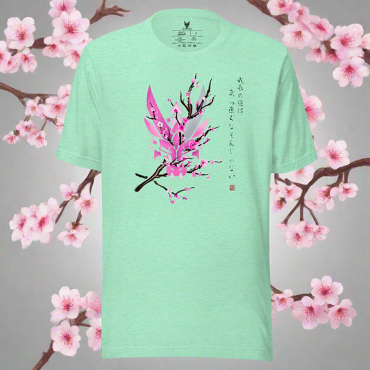 A mint green shirt features a stylized dragon head with cherry blossoms surrounding it and Japanese text that translates to "Growth is non-linear"